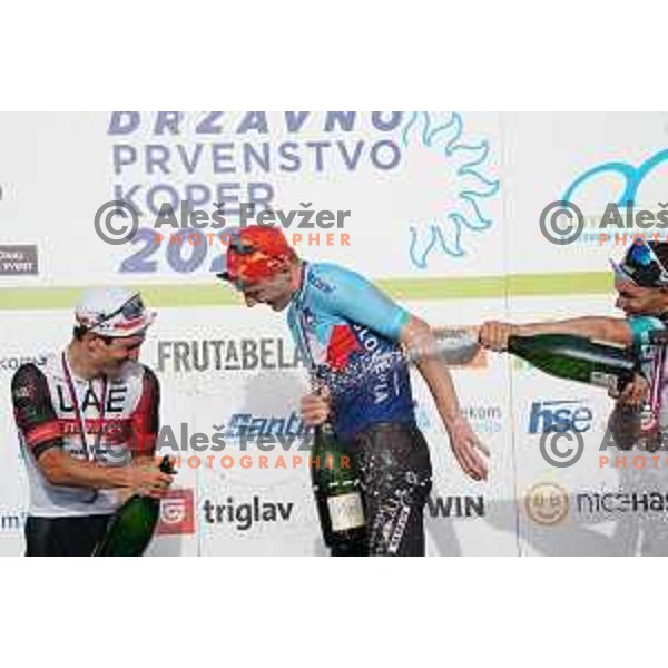 Jan Polanc (second placed), winner Matej Mohoric and Luka Mezgec (third placed) in Men’s Elite category race (174 km) at Slovenian Road Championship in Koper, Slovenia on June 20, 2021
