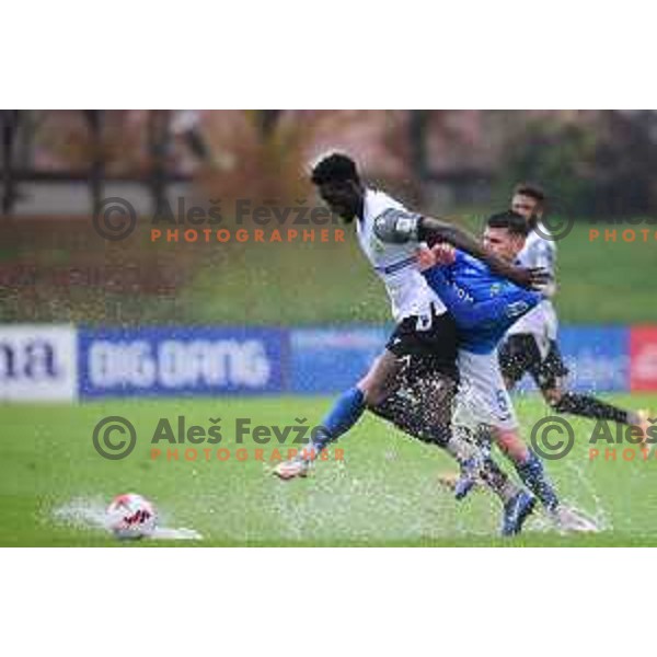Lamin Colley and Mark Spanring in action during Prva Liga Telemach football match between Bravo and Koper in Ljubljana, Slovenia on November 28, 2021