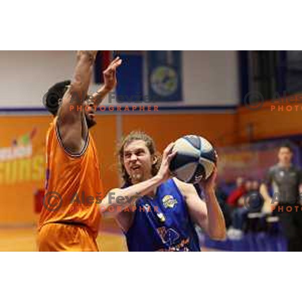 Carlbe Ervin and Gaber Ozegovic in action during Nova KBM league match between Helios Suns and Sencur GGD in Domzale, Slovenia on January 4, 2022