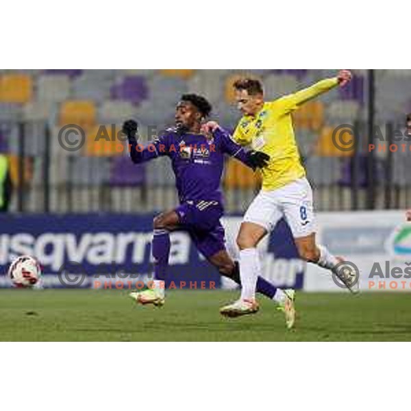 Antoine Makoumbou and Gasper Trdin in action during Prva Liga Telemach 2021-2022 football match between Maribor and Bravo in Maribor , Slovenia on March 6, 2022