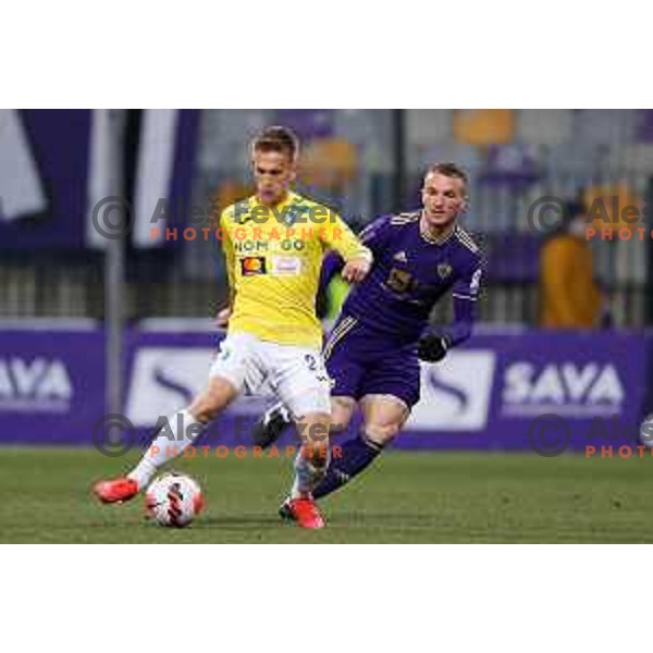 Amar Memic and Djordje Ivanovic in action during Prva Liga Telemach 2021-2022 football match between Maribor and Bravo in Maribor, Slovenia on March 6, 2022