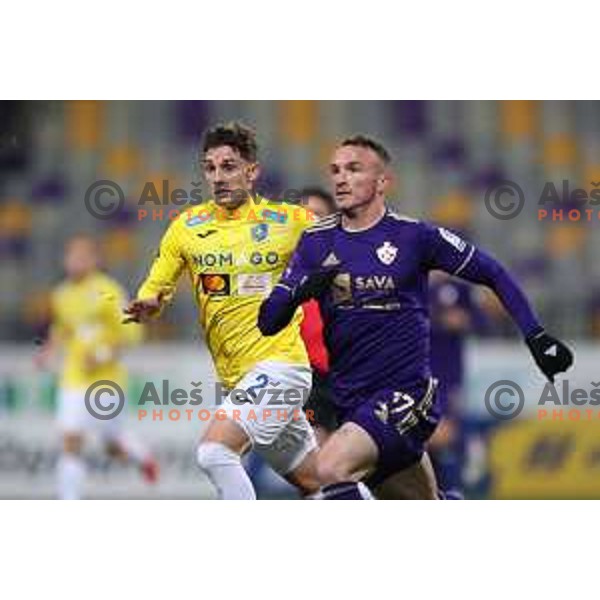 Djordje Ivanovic and Zan Trontelj in action during Prva Liga Telemach 2021-2022 football match between Maribor and Bravo in Maribor, Slovenia on March 6, 2022