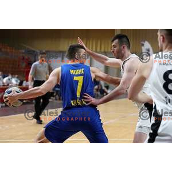 Dino Muric in action during Nova KBM league basketball match between Nutrispoint Ilirija and Sencur GGD in Tivoli Hall, Ljubljana, Slovenia on March 29, 2022 