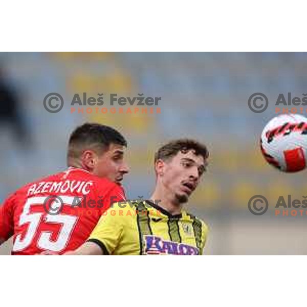 Emir Azemovic and Ivan Saric in action during Prva Liga Telemach 2021-2022 football match between Kalcer Radomlje and Aluminij in Domzale, Slovenia on April 9, 2022