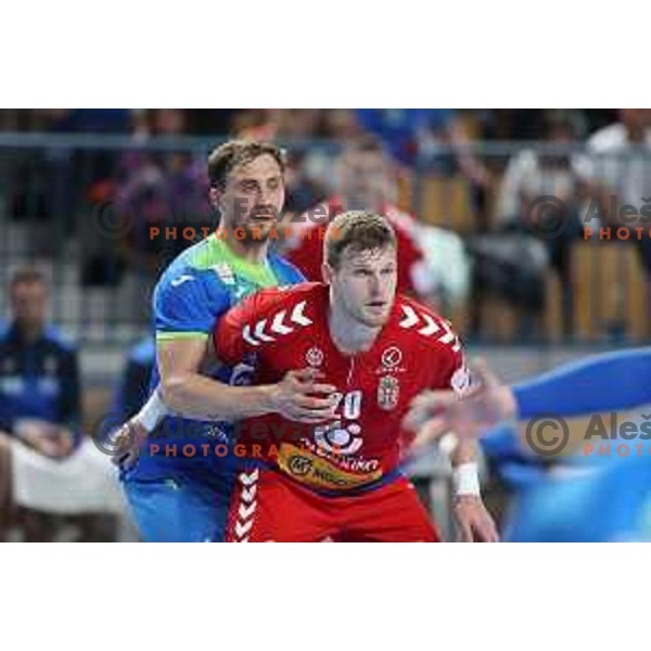 Darko Cingesar of Slovenia and Dragan Pechamlbec in action during World Championship Men 2023 Qualifiers between Slovenia and Serbia in Celje, Slovenia on April 13, 2022