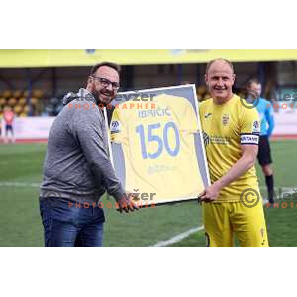Senijad Ibricic with jersey for 150 apperance in Prva Liga Telemach before football match between Domzale and Koper in Domzale, Slovenia on April 16, 2022
