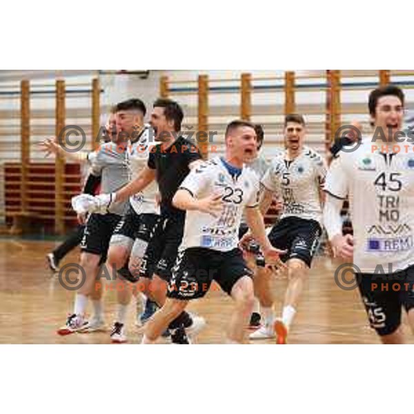Uros Udovic and players of Trimo Trebnje celebrate victory in 1.NLB league handball match Trimo Trebnje and Celje Pivovarna Lasko in Trebnje, Slovenia on April 29, 2022