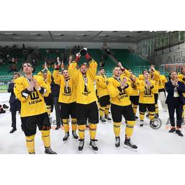 Players of Lithuania celebrate third place at IIHF Ice-hockey World Championship 2022 division I group A after victory in match between Lithuania and Romania in Ljubljana, Slovenia on May 7, 2022