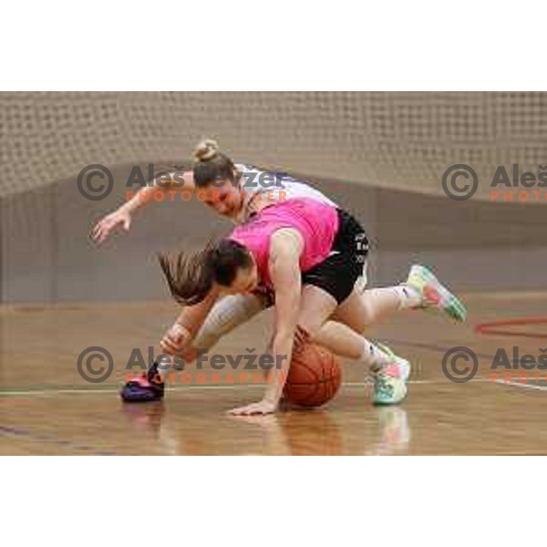 Ajda Burgar and Lea Bartelme in action during Final of 1.SKL Women basketball match between Triglav and Cinkarna Celje in Kranj, Slovenia on May 8, 2022