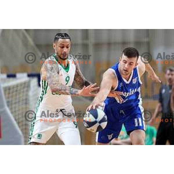 Zach Auguste and Uros Sikanic in action during first semi-final match of Nova KBM league between Cedevita Olimpija and Rogaska in Tivoli Hall, Ljubljana, Slovenia on May 14, 2022