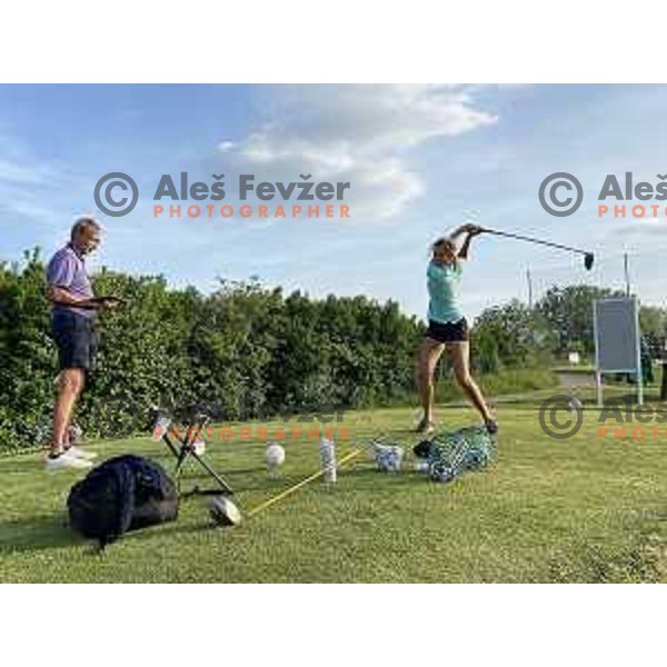 Coach Ales Babnik and Pia Babnik, Slovenian professional golfer at LET and LPGA tour during practice at her home golf course in Trnovo , Ljubljana, Slovenia on May 24, 2022