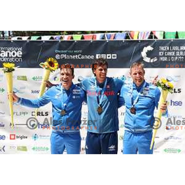 Luka Bozic (SLO) runner-up, Alexander Slafkovsky (SVK) winner and Benjamin Savsek (SLO) third placed in Men\'s C1 at ICF Canoe Slalom World Cup, Tacen, Slovenia on June 26, 2022