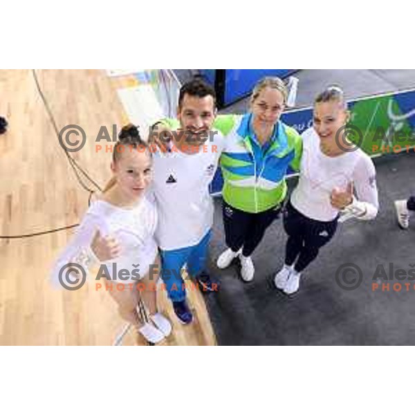 Zala Trtnik, coach Urban Sever, coach Natasa Retelj and Lucija Hribar of Slovenia at Women’s Uneven Bars at Artistic Gymnastics at Mediterranean Games in Oran, Algeria on June 29, 2022