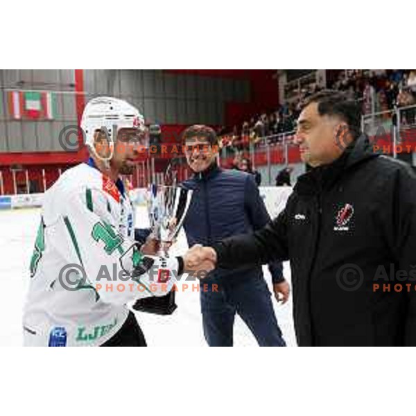 Ziga Pance with the trophy for the Slovenian ice-hockey Cup winners between SIJ Acroni Jesenice and SZ Olimpija in Podmezakla Hall, Jesenice, Slovenia on September 28, 2022