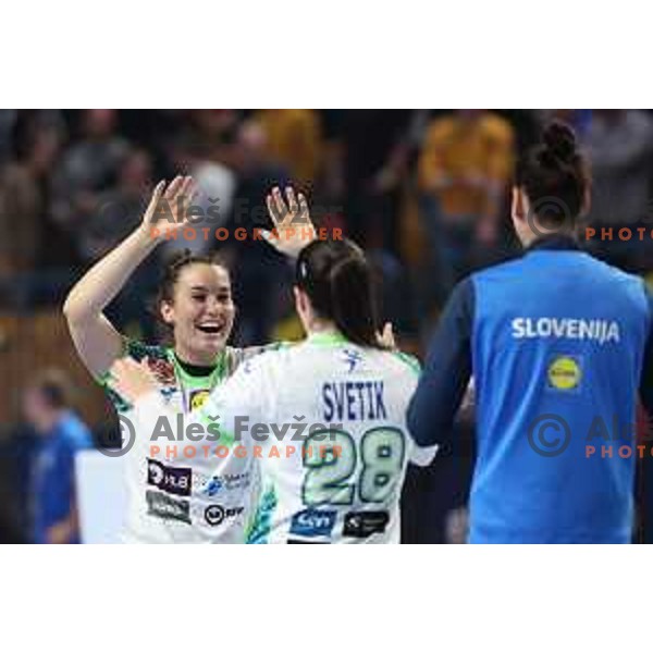 Natasa Ljepoja, Alja Varagic and players of Slovenia celebrate victory at handball match between Slovenia and Serbia at Women\'s EHF Euro 2022, Celje, Slovenia on November 8, 2022
