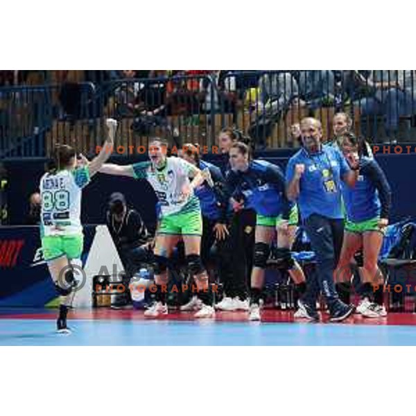 Head coach Dragan Adzic and players of Slovenia celebrate victory at handball match between Slovenia and Serbia at Women\'s EHF Euro 2022, Celje, Slovenia on November 8, 2022