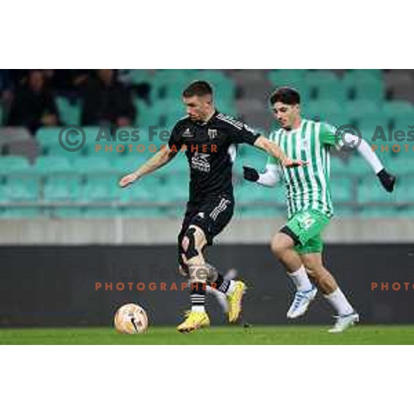 Mihael Klepac and Agustin Doffo in action during Prva Liga Telemach 2022-2023 football match between Olimpija and Mura in SRC Stozice, Ljubljana, Slovenia on December 8, 2022 