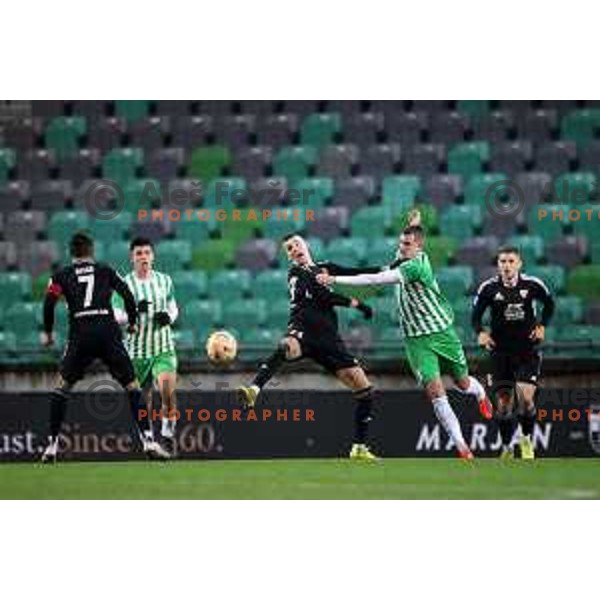 Tio Cipot and Pascal Estrada in action during Prva Liga Telemach 2022-2023 football match between Olimpija and Mura in SRC Stozice, Ljubljana, Slovenia on December 8, 2022