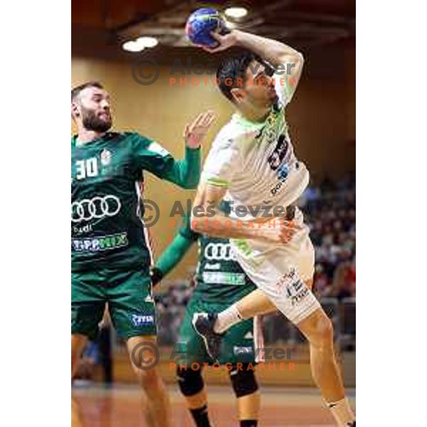 Blaz Janc in action during a friendly handball match between Slovenia and Hungary in Ljutomer, Slovenia on January 5, 2023 