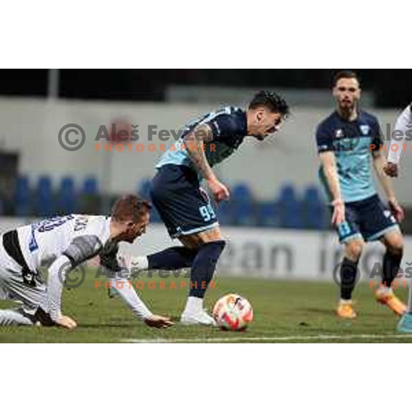 Rudi Pozeg Vancas and Alen Krajnc in action during Prva Liga Telemach 2022-2023 football match between Gorica and Koper in Nova Gorica, Slovenia on February 18, 2023