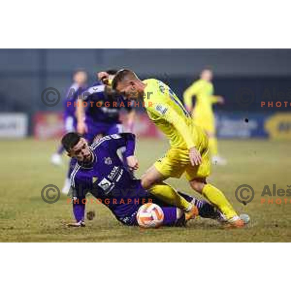 Arnel Jakupovic of Maribor and Nermin Hodzic of Domzale during Prva Liga Telemach 2022-2023 football match between Domzale and Maribor in Sportni park Domzale, Domzale, Slovenia on February 23, 2023