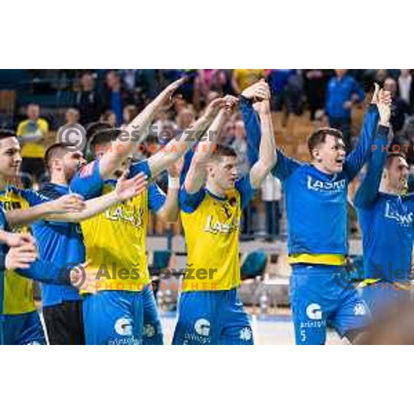 Tadej Mazej and players of Celje celebrate victory at 1.NLB league handball match between Celje Pivovarna Lasko and Gorenje Velenje in Arena Zlatorog, Celje, Slovenia on February 26, 2023