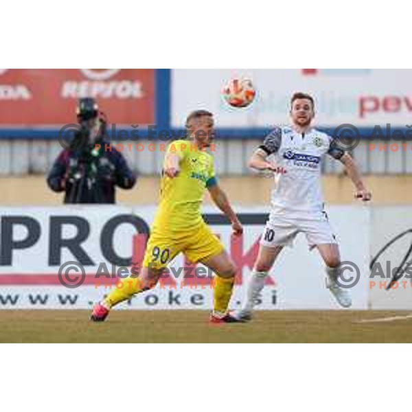 Zeni Husmani and Rudi Pozeg Vancas in action during Prva Liga Telemach 2022-2023 football match between Domzale and Koper in Domzale, Slovenia on March 4, 2023