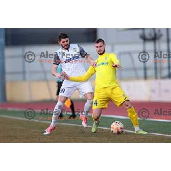 Karlo Bilic and Mirza Hasanbegovic in action during Prva Liga Telemach 2022-2023 football match between Domzale and Koper in Domzale, Slovenia on March 4, 2023