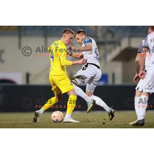 Benjamin Markus and Andrej Kotnik in action during Prva Liga Telemach 2022-2023 football match between Domzale and Koper in Domzale, Slovenia on March 4, 2023
