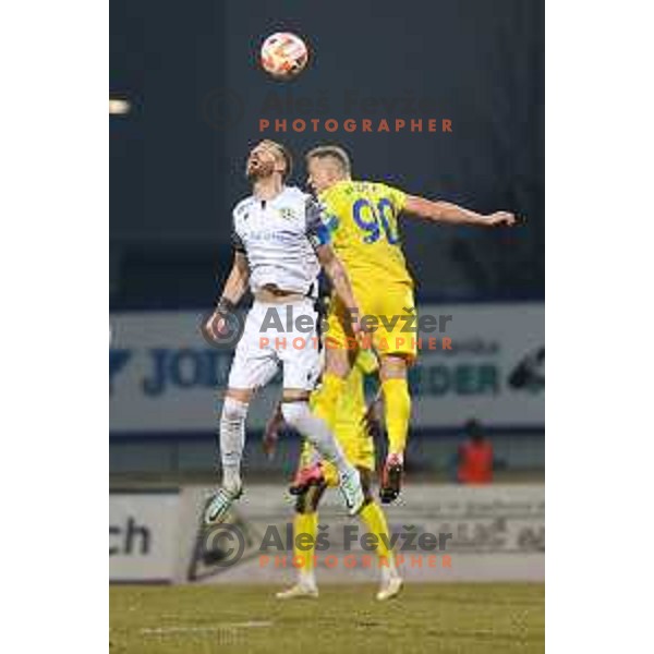 Andrej Kotnik and Zeni Husmani in action during Prva Liga Telemach 2022-2023 football match between Domzale and Koper in Domzale, Slovenia on March 4, 2023