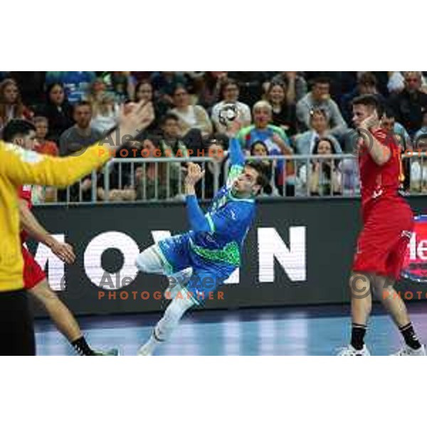 Domen Makuc in action during Men\'s Euro 2024 Qualifiers handball match between Slovenia and Montenegro in Koper, Slovenia on March 12, 2023