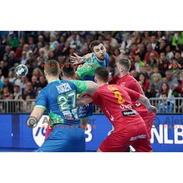 In action during Men\'s Euro 2024 Qualifiers handball match between Slovenia and Montenegro in Koper, Slovenia on March 12, 2023