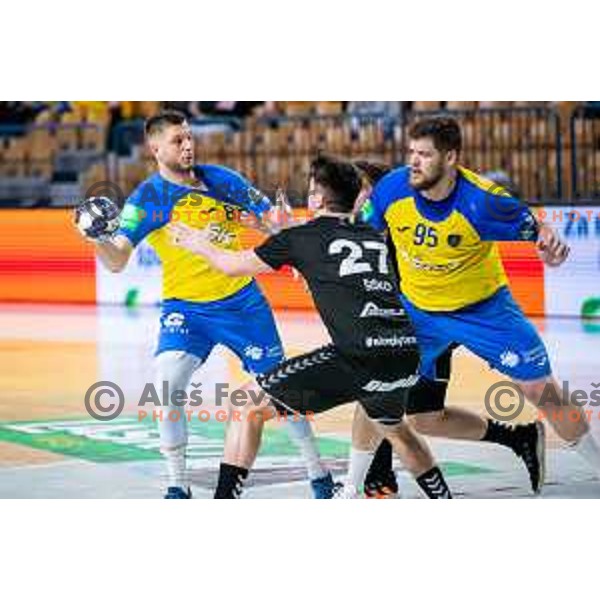 Aleks Vlah and Matic Suholeznik in action during Slovenian cup handball match between Celje Pivovarna Lasko and Gorenje Velenje in Arena Zlatorog, Celje, Slovenia on March 15, 2023