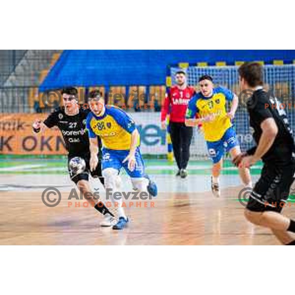 Aleks Vlah in action during Slovenian cup handball match between Celje Pivovarna Lasko and Gorenje Velenje in Arena Zlatorog, Celje, Slovenia on March 15, 2023