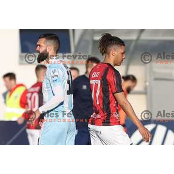 Nejc Mevlja and Zacharie Lulu Iscaye in action during Prva Liga Telemach 2022-2023 football match between Tabor Sezana and Gorica in Sezana on March 16, 2023