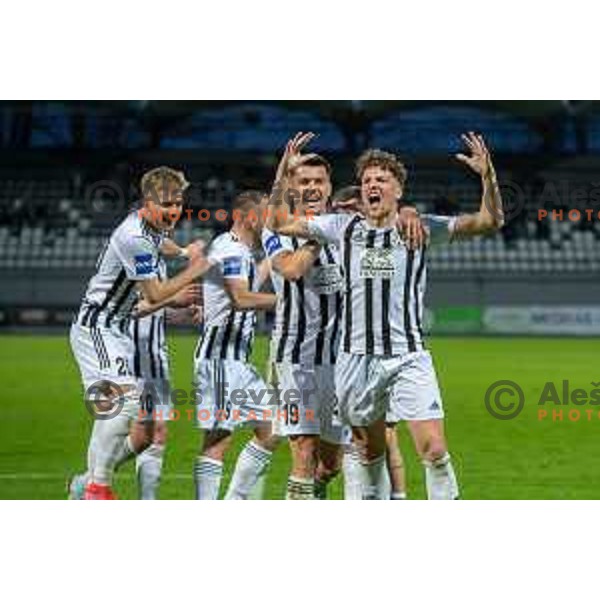Kai Cipot, Mirlind Daku and players of Mura celebrate goal during Prva Liga Telemach 2022-2023 football match between Mura and Olimpija in Murska Sobota on March 19, 2023