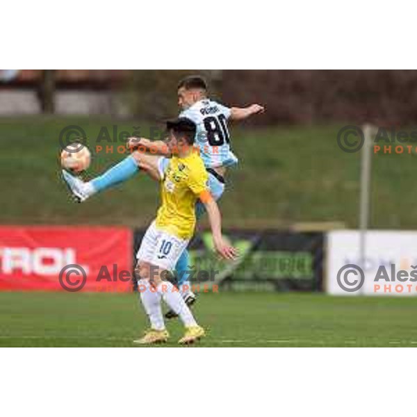 Martin Kramaric and Zvonimir Petrovic in action during Prva Liga Telemach 2022-2023 football match between Bravo and Gorica in Ljubljana, Slovenia on March 19, 2023