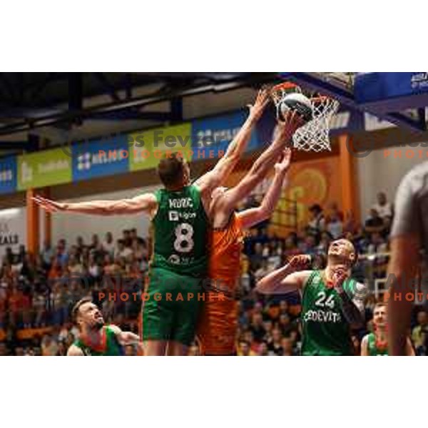 Edo Muric of Cedevita Olimpija and Tibor Mirtic of Helios Suns in action during the third game of The Final of Nova KBM league between Cedevita Olimpija and Helios Suns in Domzale, Slovenia on June 8, 2023 Foto: Filip Barbalic