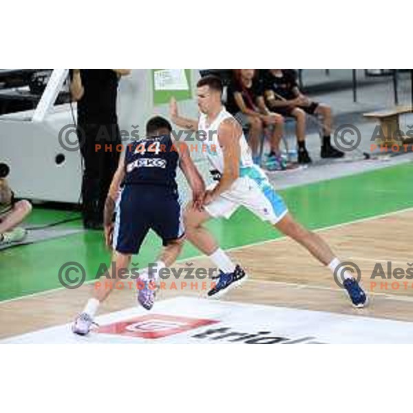 Dinos Mitoglou and Vlatko Cancar in action during Telemach friendly match in preparation for World Cup 2023 between Slovenia and Greece in Ljubljana on August 2, 2023. Foto: Filip Barbalic