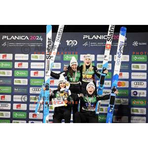 Ajda Kosnjek, Jerica Jesenko, Taja Bodlaj and Tina Erzar of Team Slovenia, World Champions in Women Team Ski Jumping at Normal Hill during Planica FIS Nordic Junior World Ski Championships, Slovenia on February 9, 2024
