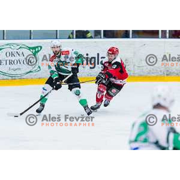 MAGOVAC Aleksandar of HK SZ Olimpija and BOHINC Martin of HDD SIJ Acroni Jesenice In action during the fourth game of the Final of the Slovenian Ice-hockey League between SZ Olimpija and SIJ Acroni Jesenice in Tivoli Hall, Ljubljana, Slovenia on March 15, 2024