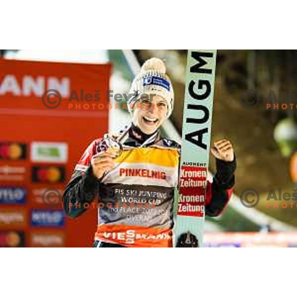 Eva Pinkelnig of Austria during trophy and medal ceremony after the final round of FIS Ski Jumping competition in Planica, Slovenia on March 21, 2024