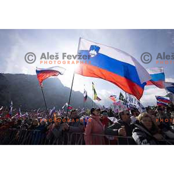 Slovenian fans with flags and banners support ski jumpers at Team Competition during the Final of the World Cup ski jumping in Planica, Slovenia on March 23, 2024