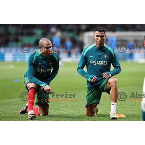 Pepe and Cristiano Ronaldo of Portugal National Football team during warm-up before friendly match against Slovenia in Ljubljana, Slovenia on March 26, 2024