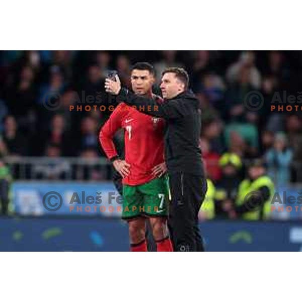 Janez Kozelj takes a selfie and kisses Ronaldo during friendly football match between Slovenia and Portugal in Ljubljana, Slovenia on March 26, 2024