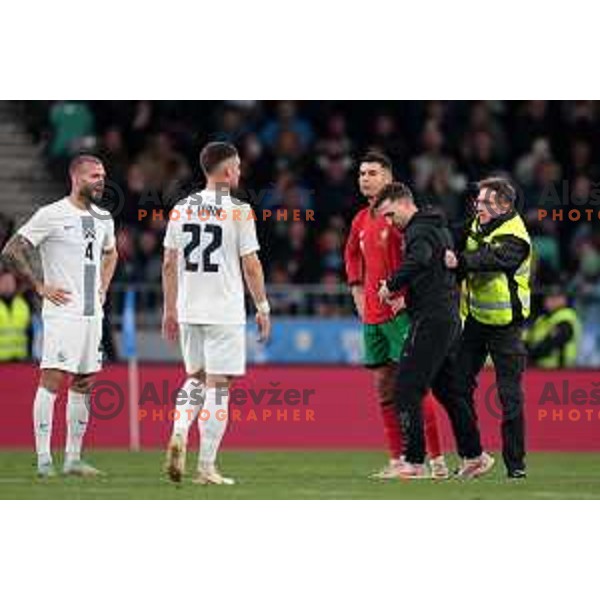 Janez Kozelj takes a selfie and kisses Ronaldo during friendly football match between Slovenia and Portugal in Ljubljana, Slovenia on March 26, 2024