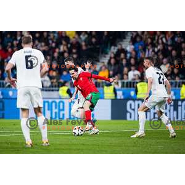 Vitinha of Portugal vs Petar Stojanovic of Slovenia in action during Friendly football match between Slovenia and Portugal in Stadium Stozice, Slovenia on March 26, 2024. Photo: Grega Valancic
