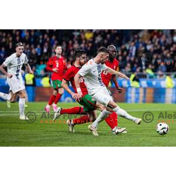 Ruben Neves of Portugal vs Adam Gnezda Cerin of Slovenia in action during Friendly football match between Slovenia and Portugal in Stadium Stozice, Slovenia on March 26, 2024. Photo: Grega Valancic