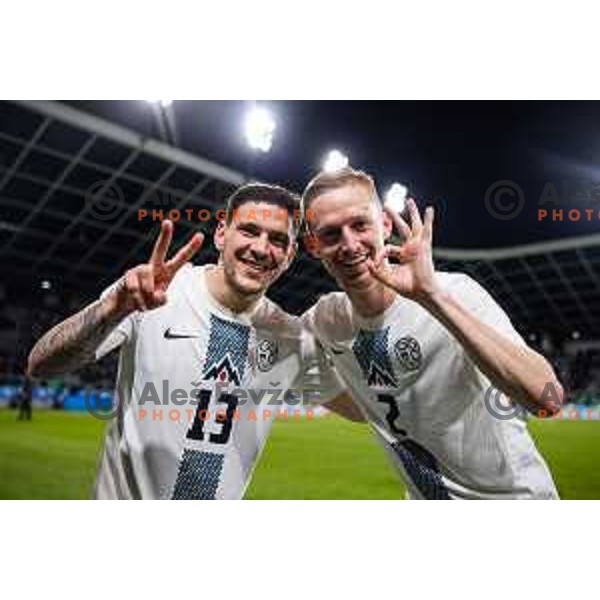 Erik Janza and Zan Karnicnik of Slovenia in action during a friendly football match between Slovenia and Portugal in Stadium Stozice, Slovenia on March 26, 2024. Photo: Grega Valancic
