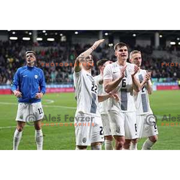 Adam Gnezda Cerin, Jaka Bijol, and Zan Karnicnik salute to the fans after a friendly football match between Slovenia and Portugal in Ljubljana, Slovenia on March 26, 2024